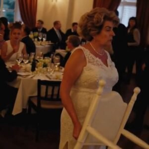 My mother-in-law insisted on sitting between us on our wedding day—and she never expected the reaction it would provoke.